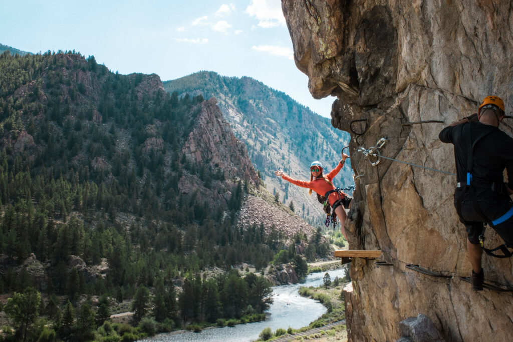 Person on a Via Ferrata course in Colorado.