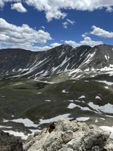 woman climbing Kelso Ridge near Torrey's Peak